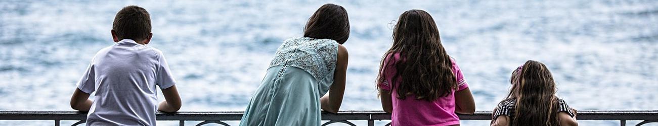 Children looking at sea