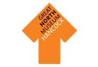 Thick orange arrow pointing up with the words Great North Museum Hancock inside it.